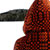 figure in orange hood, viewed from behind
