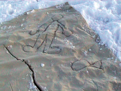 Drawing of a figure on material, on snow
