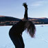 woman performing on frozen lake