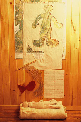 cut out figure, map and knitting materials